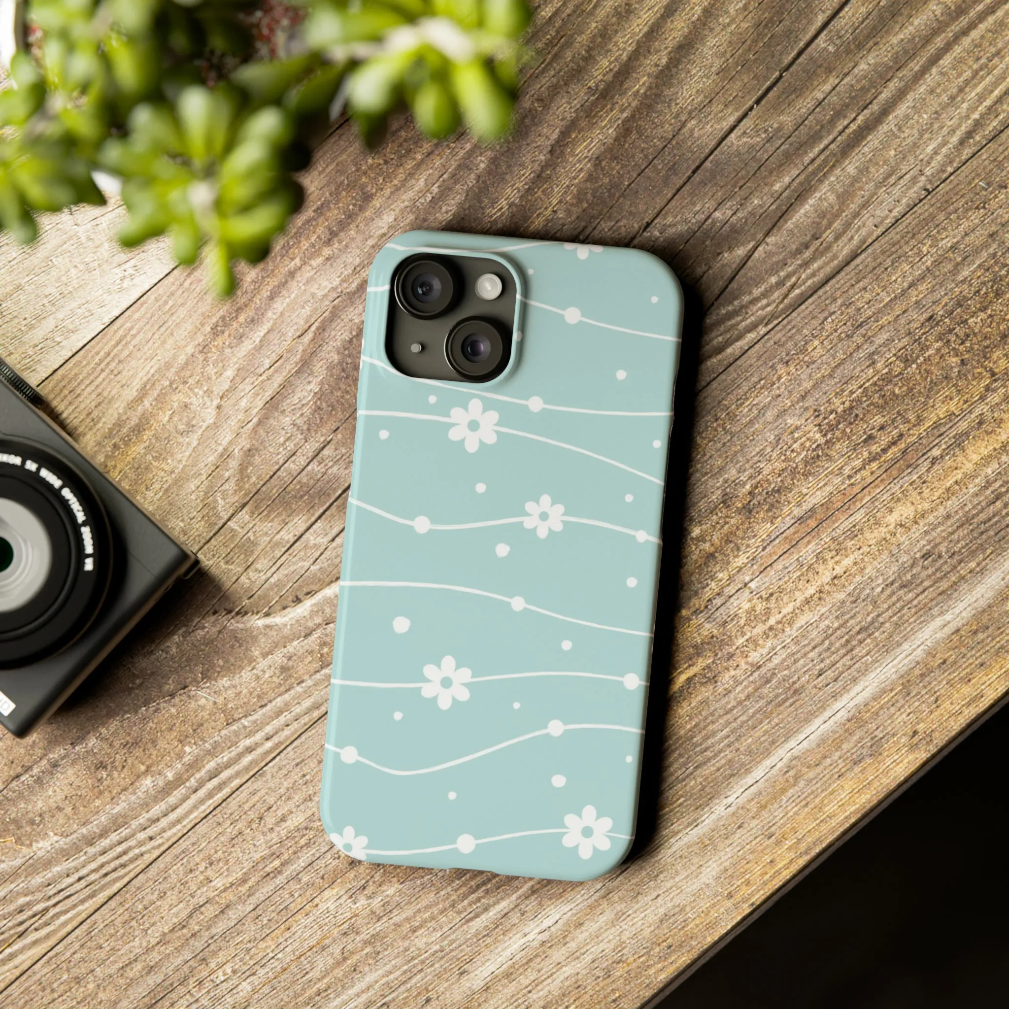 Blue background and White Daisies Polka Dots Design Sleek Elegance Wireless-Charging Compatible Phone Case Slim Phone Case compatible with over 20 iphone models