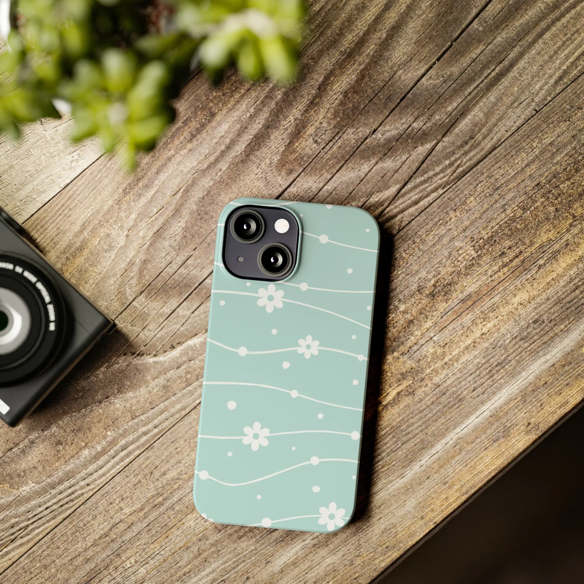 Blue background and White Daisies Polka Dots Design Sleek Elegance Wireless-Charging Compatible Phone Case Slim Phone Case compatible with over 20 iphone models